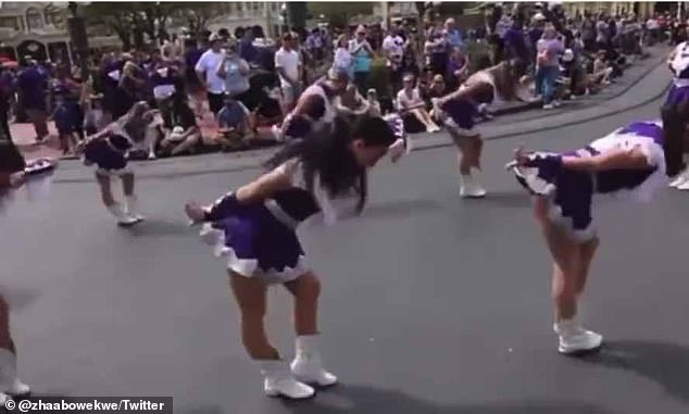 The all-female performance, at least 50 members of the band, saw high school students march and dance in fringed costumes along Main Street, USA, in the park's Magic Kingdom to aboriginal-inspired music, with moves drawn from Native American cultures.