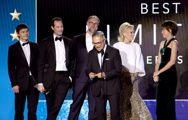 From left, Evan Peters, Brad Ingelsby, Craig Zobel, Mark Roybal, Jean Smart and Julianne Nicholson accept the award for best limited series for “Mare of Easttown.”