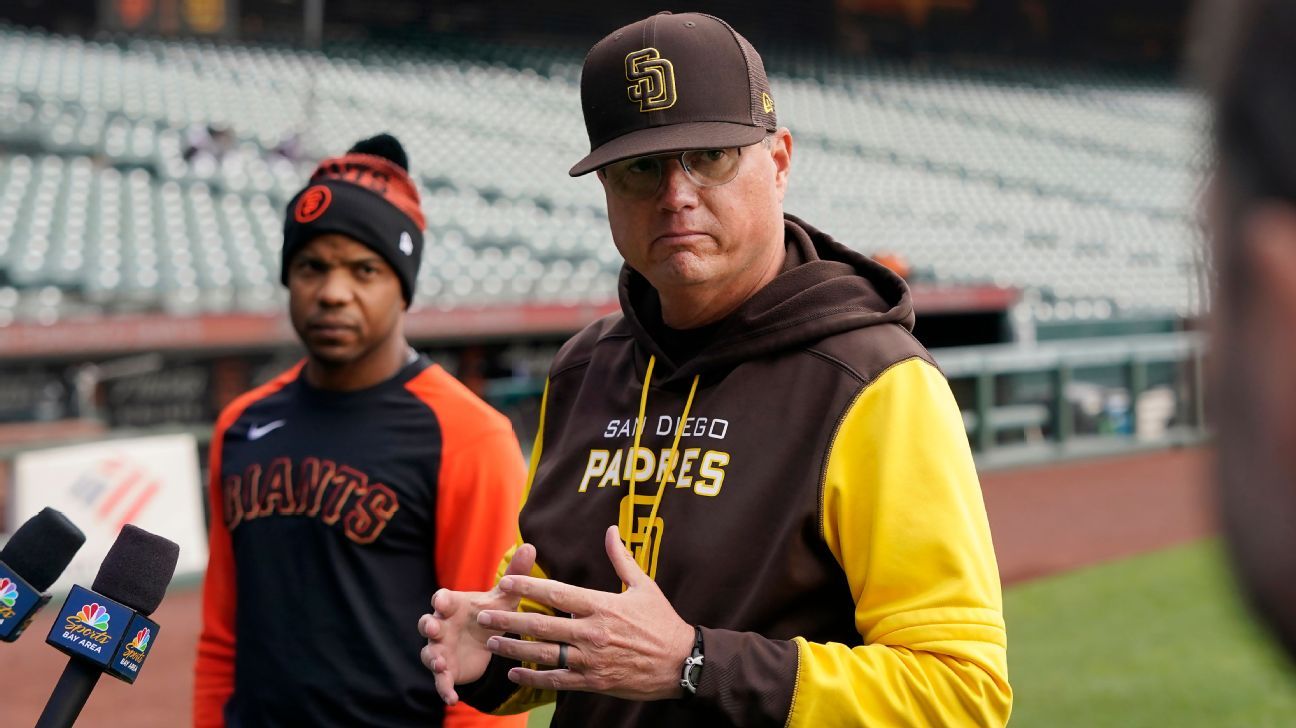 San Francisco Giants first base coach Antoine Richardson and third base coach San Diego Padres Mike Shieldt clear the air after the game