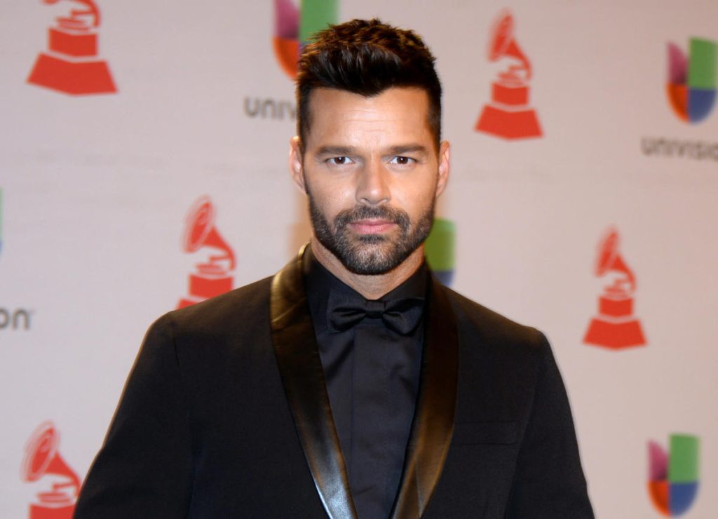 Ricky Martin denies domestic violence allegations after police issue restraining order