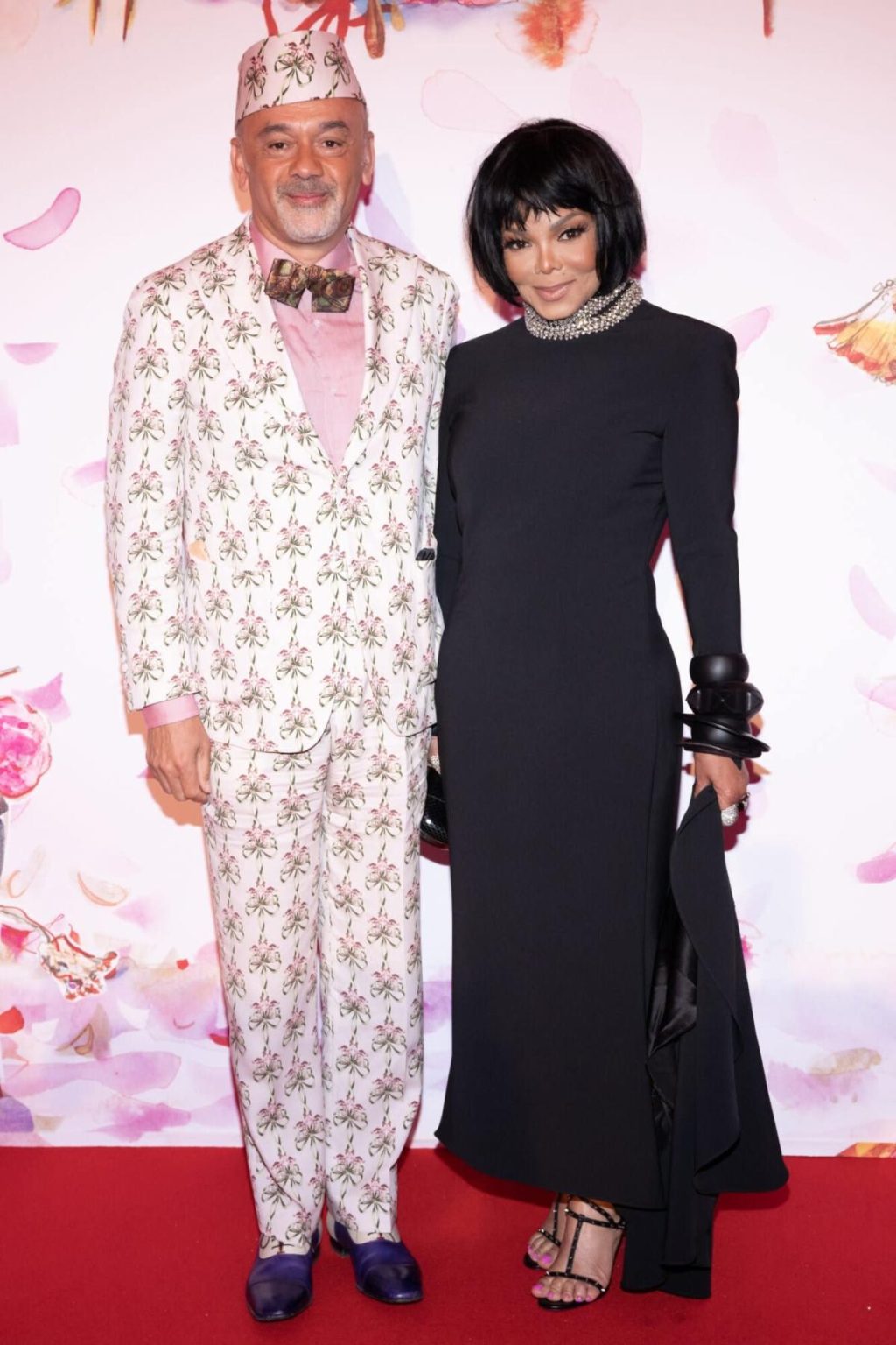 Janet Jackson looks elegant in black posing with Christian Louboutin at the Rose Ball in Monaco