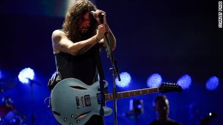 Grohl seemed visibly emotional at the party as he honored the life of his longtime colleague and friend. 
